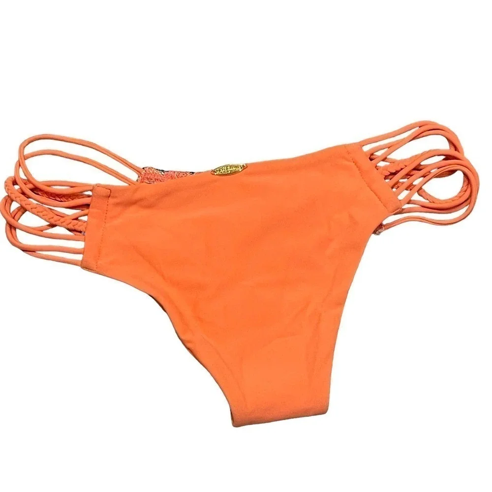 Luli Fama strappy side